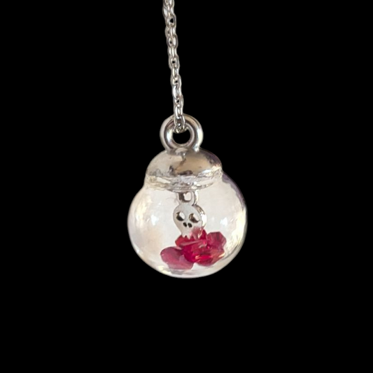 Collar con bola de vidrio con calaverita